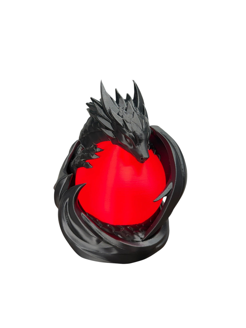 Black dragon wrapped around a glowing red orb lamp